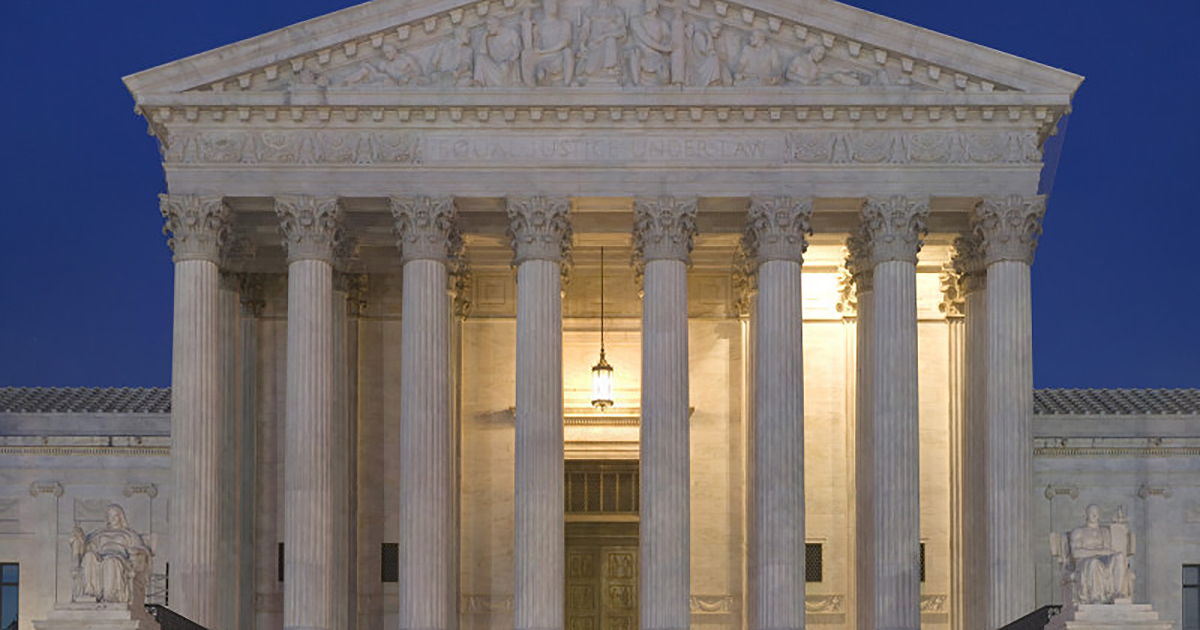 View photo of Supreme Court at dusk